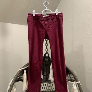 burgundy skinny jeans